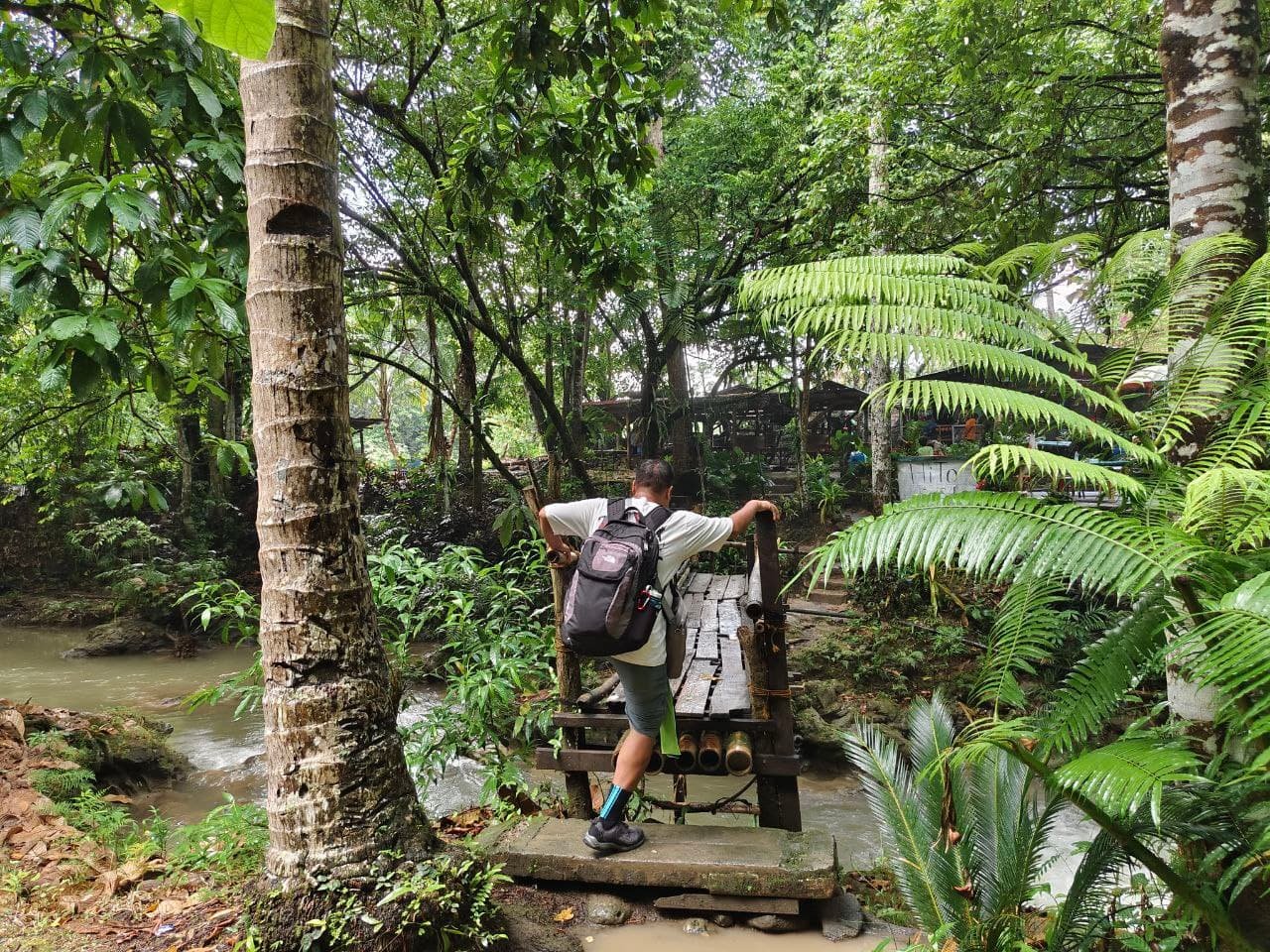 Panas Falls climbing the bridge