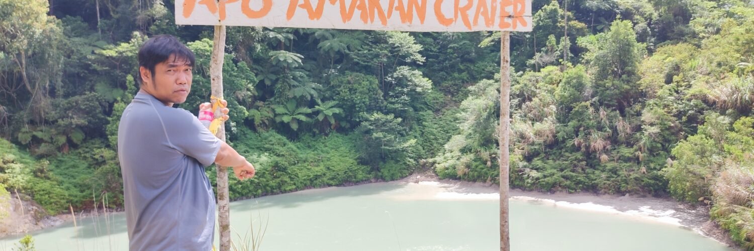 A hiker in Apo Amacan Crater in Mawab Davao de Oro