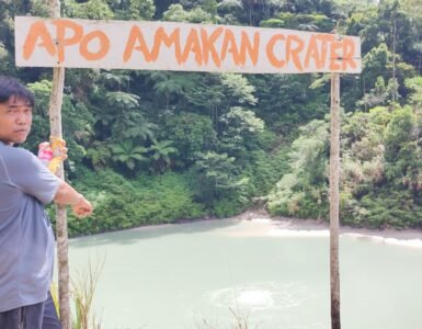 A hiker in Apo Amacan Crater in Mawab Davao de Oro