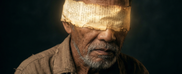 A hyper-realistic close-up portrait of an elderly Filipino man with a pensive expression, wearing a worn linen shirt. A blindfold made of aged, glowing parchment with Latin scripture covers his eyes, set against a dark, moody background with dramatic cinematic lighting.