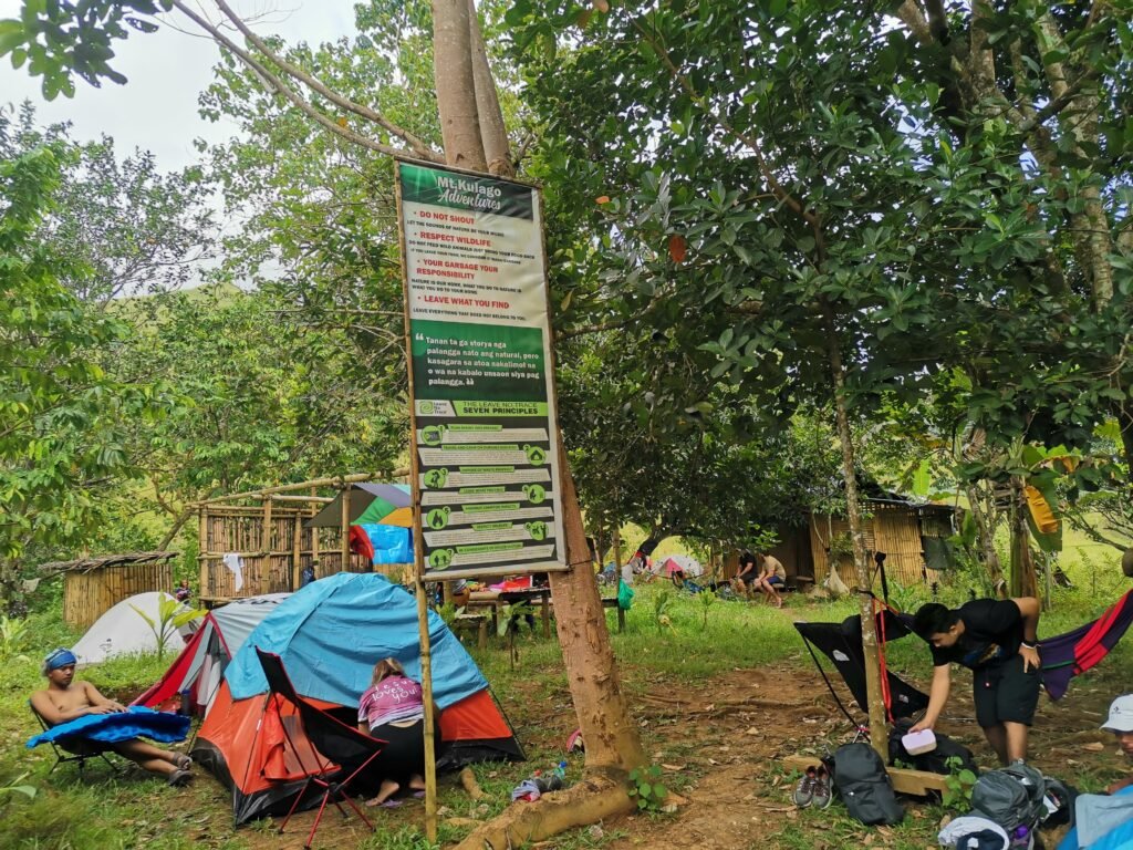 Mt. Kulago Impasugong Bukidnon campsite tents and signage. Camping by Manakaay ug Bukid.