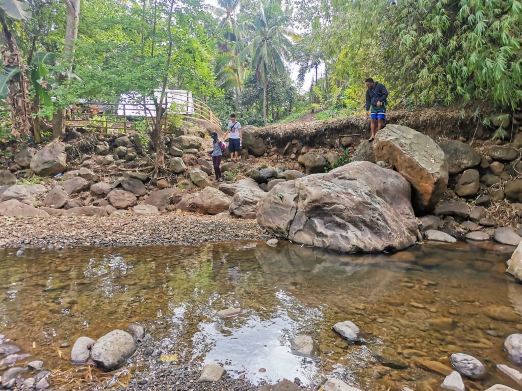 River crossing at Viper Peak at Bato Toril Davao guided by Manakaay ug Bukid.