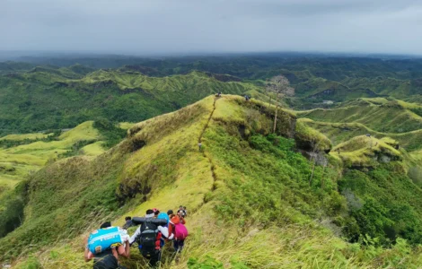 Mt. Megatong Sto. Tomas Davao del Norte hiking at grasslands with beautiful background ridges. Visited by Manakaay ug Bukid.