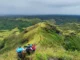 Mt. Megatong Sto. Tomas Davao del Norte hiking at grasslands with beautiful background ridges. Visited by Manakaay ug Bukid.