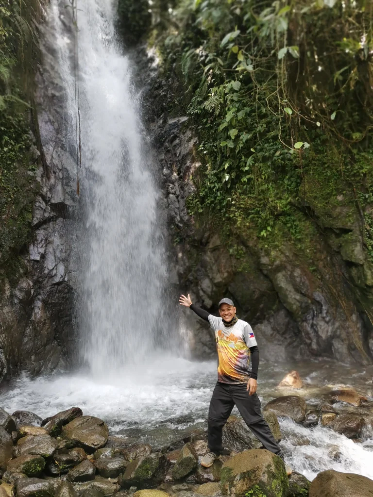 Tagbibinta Falls Maragusan Davao de Oro center falls surrounded by natural rustic stones.