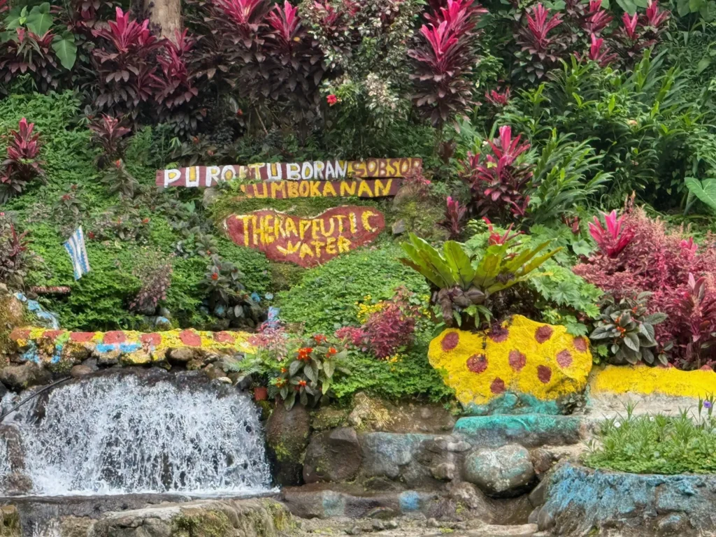 Purok Tuboran Sobsob Lumbokanan Therapeutic Water signage on the pool of Sobsob Spring Water