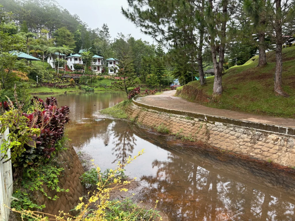 Reel Place Lorega pathway going to the rooms beside the man-made lake