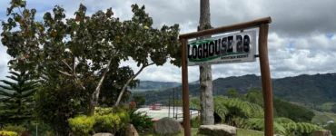 loghouse 28 mountain resort kitaotao bukidnon signage with landscape view