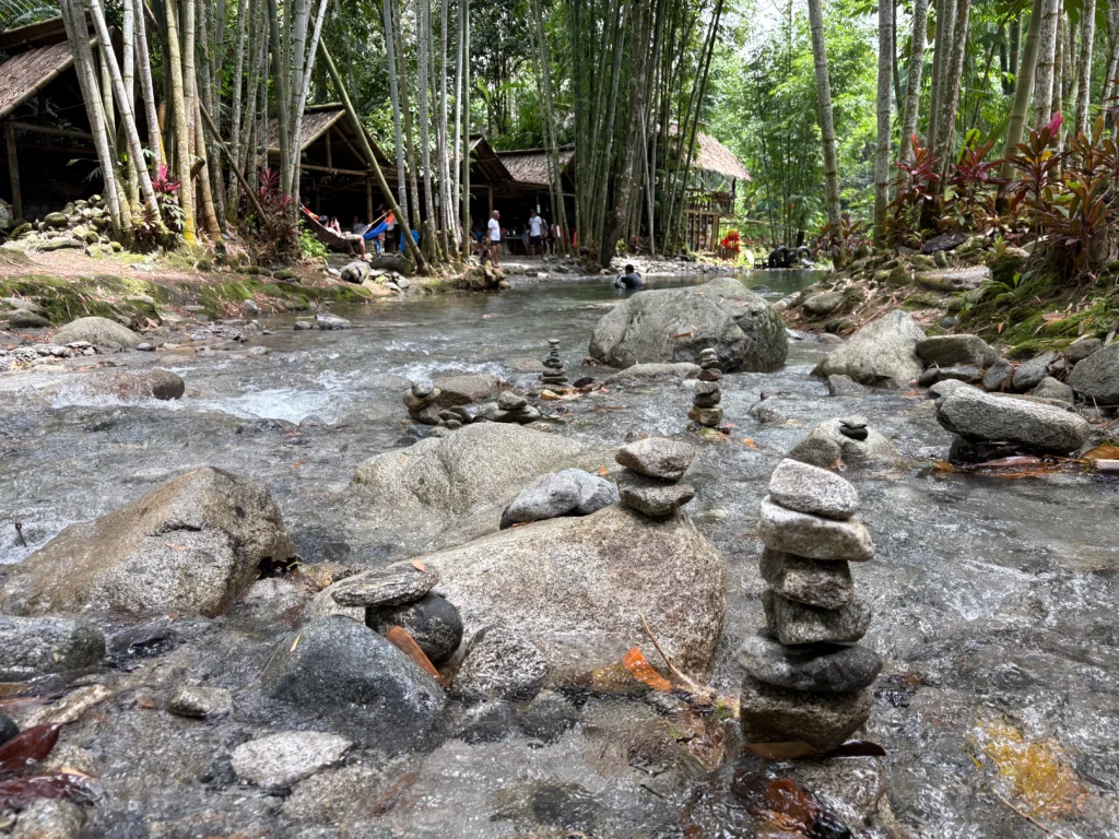 Silmaro Bamboo Nature Park Maragusan stone stacking in the cold river