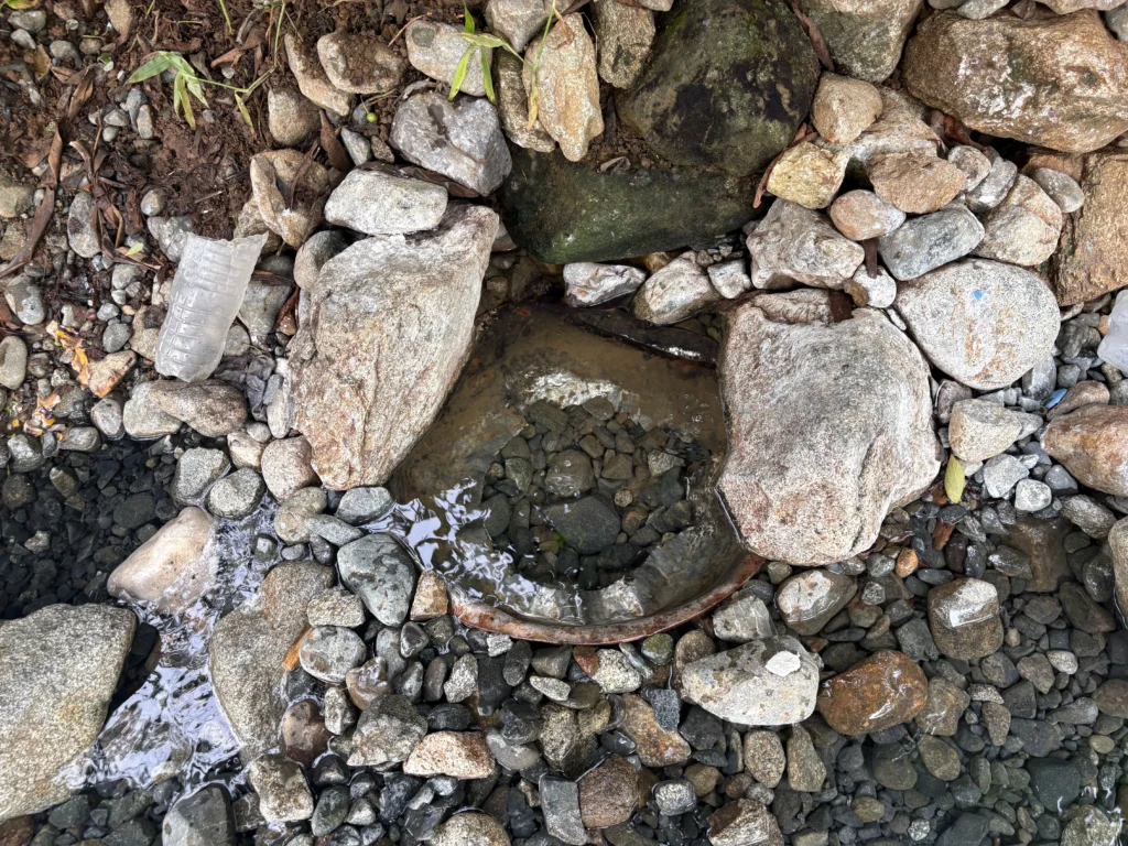 Bukal sa Kanal Natural Hot Springs Purok Mainit Maragusan hot water spring from under these rocks.