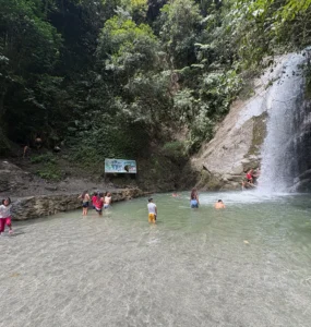 locals swimming in marangig falls maragusan davao de oro