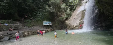 locals swimming in marangig falls maragusan davao de oro