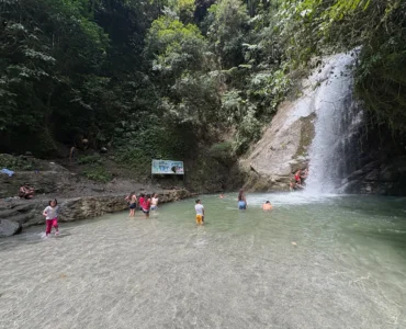 locals swimming in marangig falls maragusan davao de oro