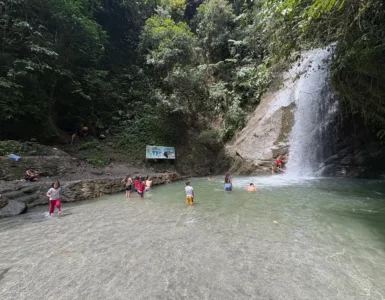 locals swimming in marangig falls maragusan davao de oro