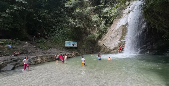 locals swimming in marangig falls maragusan davao de oro