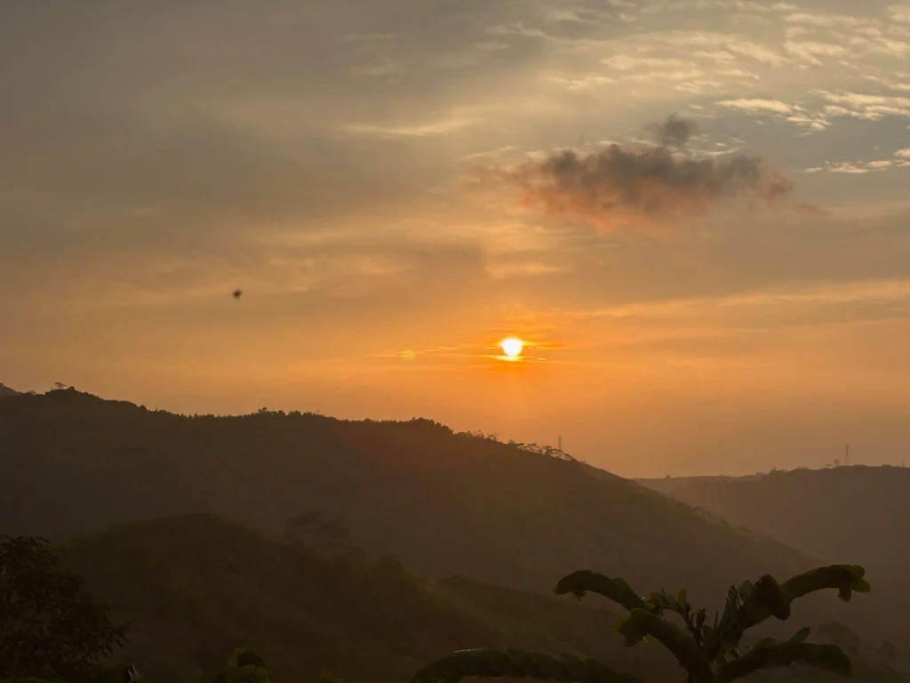 Blue Ridge Campsite Sitio Kabalansihan, Brgy. Sinuda, Kitaotao, Bukidnon sunset drop view of the ridges in clear sky.