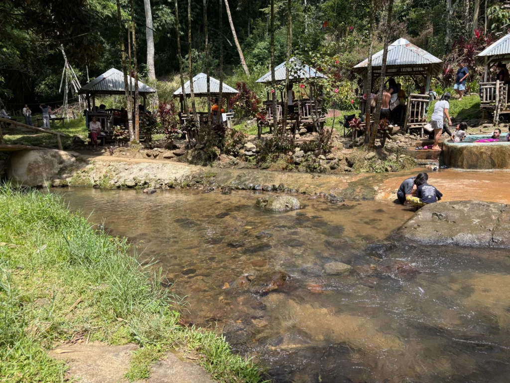 marawer hot spring in kapatagan davao del sur river water flowing beside the cottages