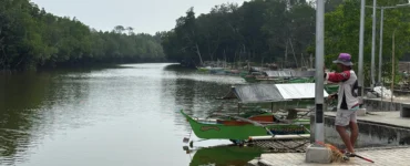 Nabintad River Park in Madaum, Tagum Davao del Norte boat pier and wide river expanse for tour